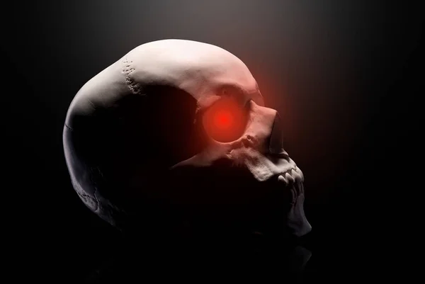 Model Lidské Lebky Červenýma Očima Izolovanými Černém Pozadí Oříznutou Pěšinou — Stock fotografie