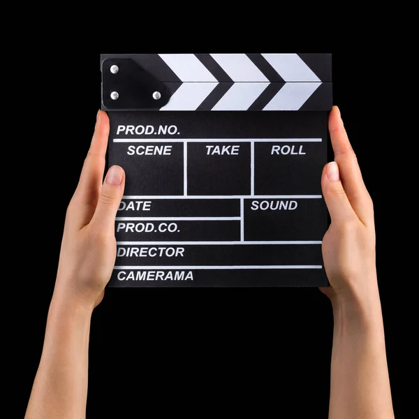 Siyah zemin üzerinde izole edilmiş insan el ele tutuşan film alkışlama tahtası — Stok fotoğraf