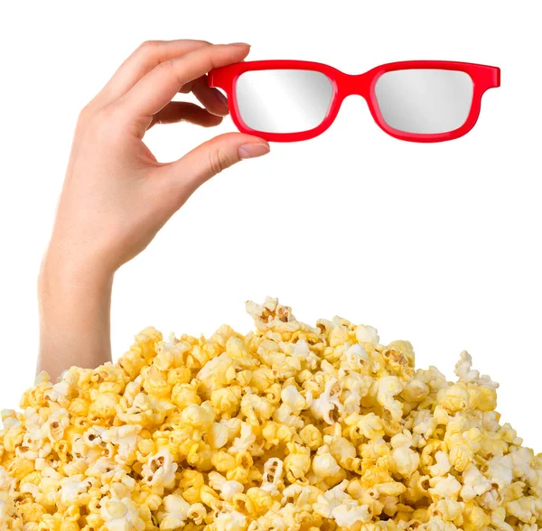 Tangan perempuan tongkat keluar dari tumpukan popcorn terisolasi pada latar belakang putih — Stok Foto