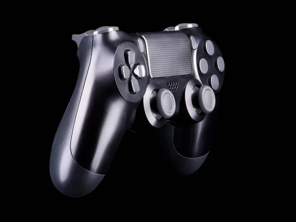 Juego de video negro joystick gamepad aislado sobre un fondo negro — Foto de Stock