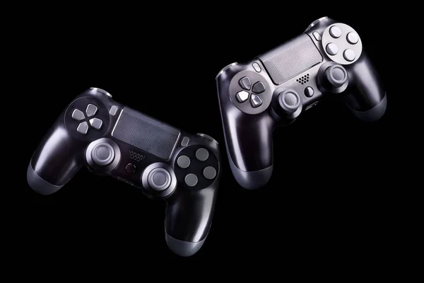 Conjunto de joysticks de videogame preto gamepad isolado em um fundo preto — Fotografia de Stock