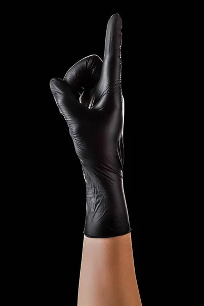 Hand Black Gloves Index Finger Pointing Isolated Black Background Isolated — Stock Photo, Image