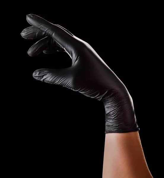Hand Black Gloves Taking Showing Something Black Background Isolated Clipping — Stock Photo, Image