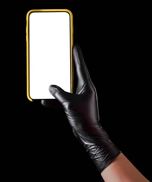 Hand Black Glove Holding Mobile Phone Blank Screen Black Background — Stock Photo, Image