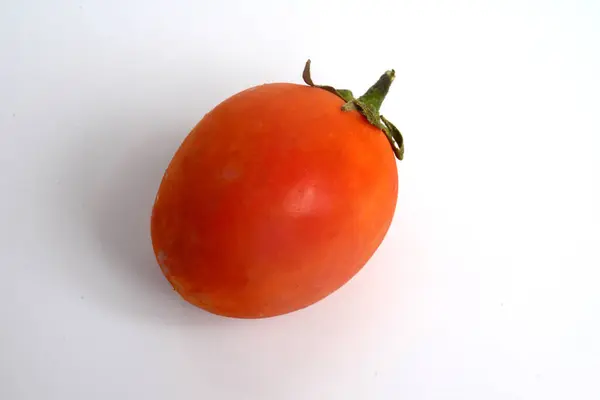 食用果実のために広く栽培されているナイトシェード科 ソラナ科 の開花植物であるトマト Solanum Lycoopersicum 栄養のための野菜として表示 — ストック写真