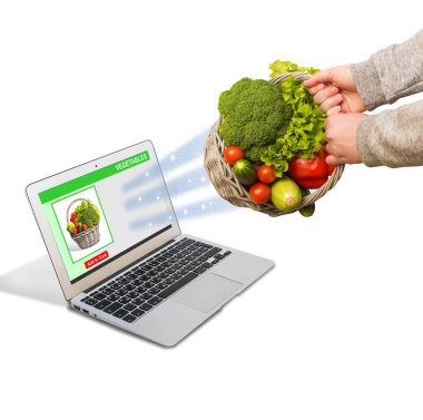 On-line Alışveriş kavramı. Internet bağlantısı, bir dizüstü bilgisayar satın sebze sepeti.