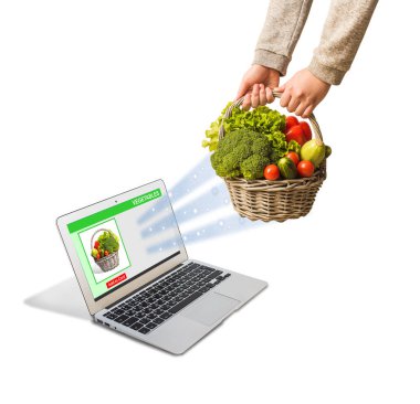 On-line Alışveriş kavramı. Internet bağlantısı, bir dizüstü bilgisayar satın sebze sepeti.