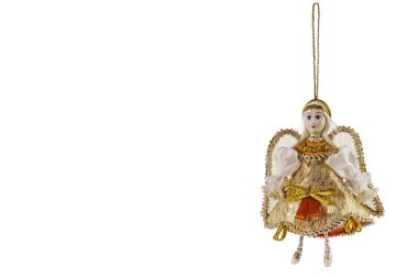 Beyaz, izole bir arka planda, iç mekanda bir melek şeklinde bir Noel oyuncağı..