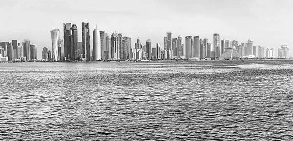 Panoramic view on financial center of Doha from West Bay. Doha is a city on the coast of the Persian Gulf, the capital and largest city of the Arab state of Qatar, Panoramic landscape