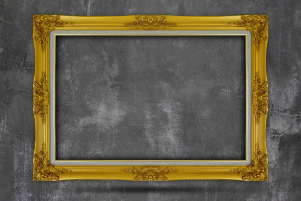 Antique golden frame on grunge wall. — Stock Photo, Image