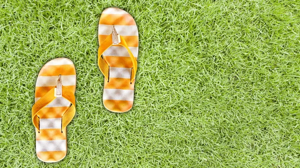 Orange Sandal Background Green Grass — Stock Photo, Image