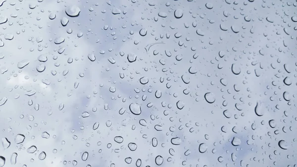 Water drop on glass windows background — Stock Photo, Image