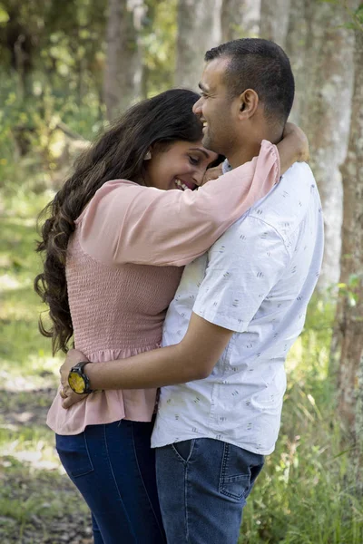 Romantic, married Indian couple in an outdoor location