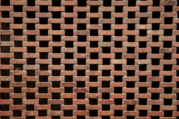 Фон Кирпичной Стены Построенной Большим Количеством Отверстий — стоковое фото