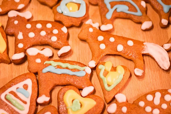 Gingerbread colorful decorated cookies - Christmas bears, hearts