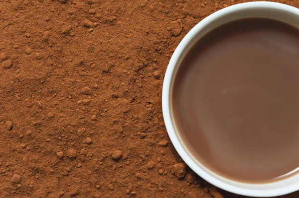Hot chocolate and cocoa powder — Stock Photo, Image