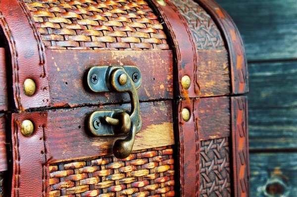 Old chest on a wooden background