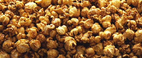 Panorama of caramel popcorn — Stock Photo, Image