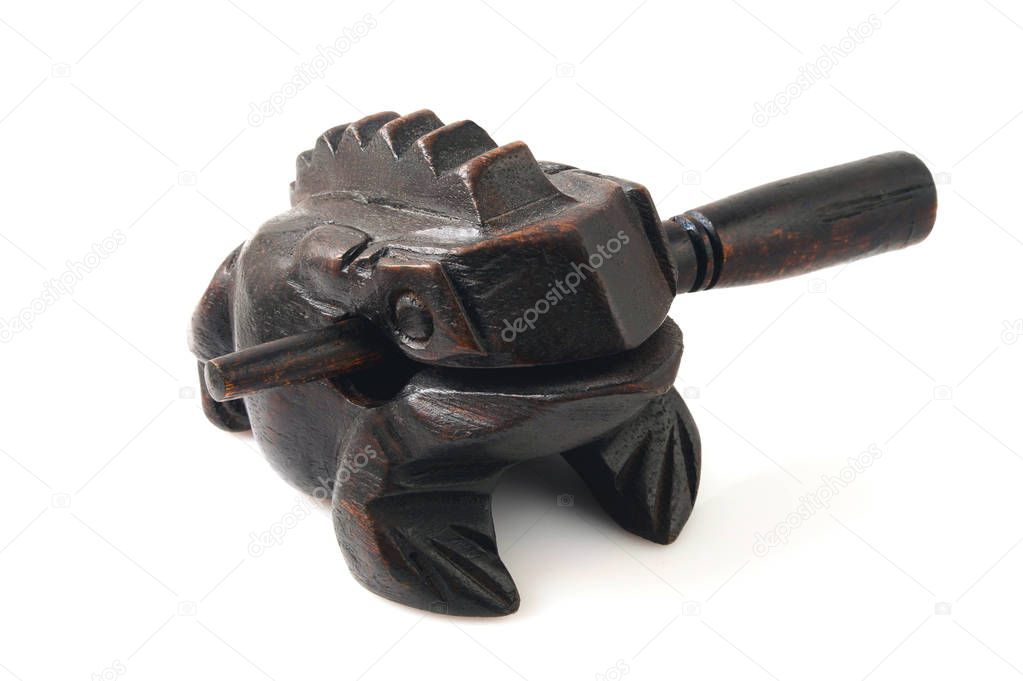 Wooden frog, souvenir, isolated on white.
