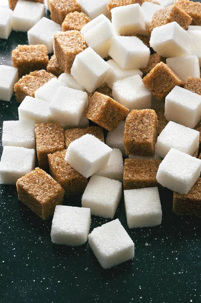 Sugar cubes on a dark background