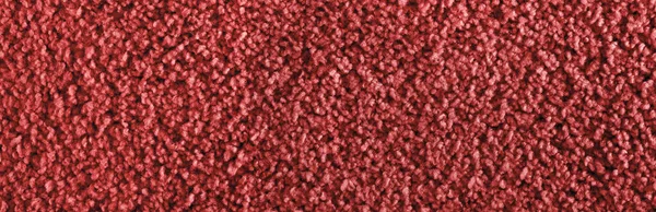 Texture of red carpet. Panorama. View from above.