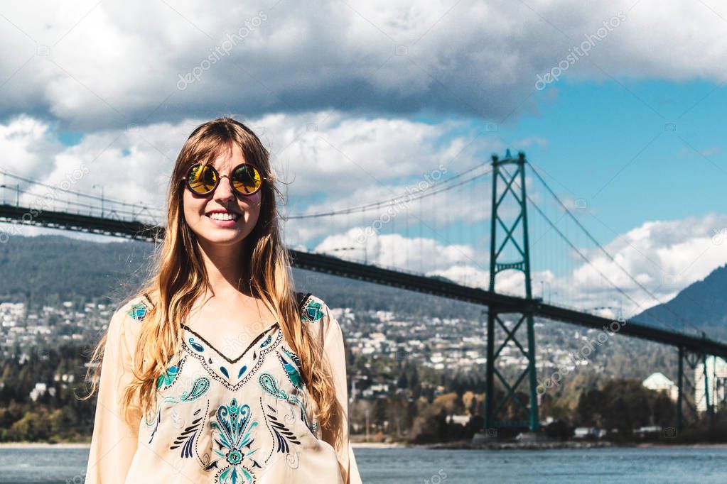 Girl at Lions Gate Bridge in Vancouver, BC, Canada