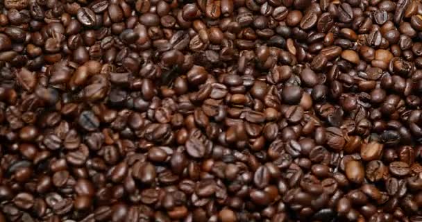 La caída de granos de café — Vídeos de Stock