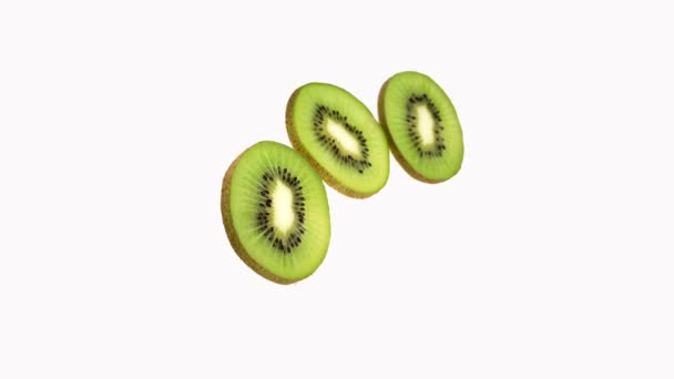 Kiwi, actinidia chinensis, Fruta contra fondo blanco, 4K en tiempo real, imagen en movimiento — Vídeo de stock