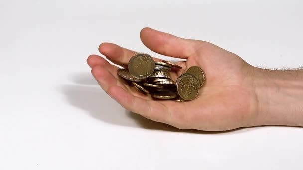 Hand of Man Falling with Euro Coins against White Background, Slow Motion — Stock Video