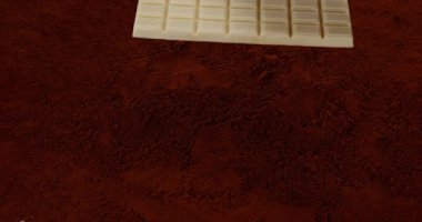 Çikolata Tablet Çikolata tozu üzerinde düşen