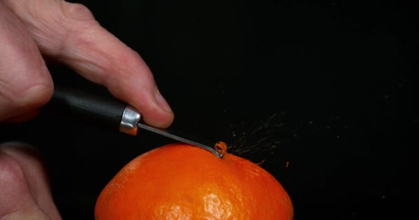 Orange zest against Black — Stock Video