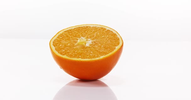 Orangenfrucht fließt — Stockvideo