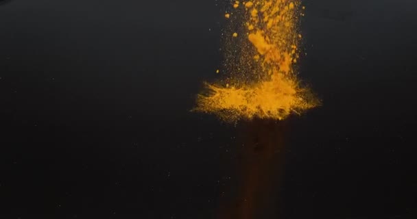 Turmeric Curcuma Longa Powder Falling Black Background Indian Spice Slow — Stock Video