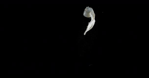 Szklanka Mleka Bouncing Splashing Czarnym Tle Slow Motion — Wideo stockowe