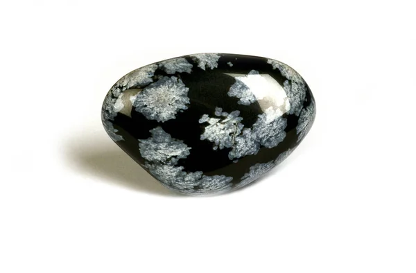Speckled Obsidian Stone Białym Tle — Zdjęcie stockowe
