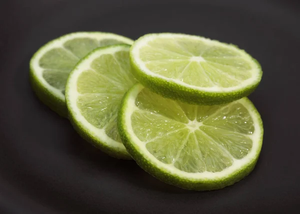 Green Lemon Citrus Aurantifolia Black Background — Stock Photo, Image