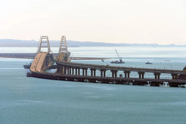 Crimean Bridge across Kerch Strait between Black and Azov Seas connecting Kuban and Crimea. Close telephoto view from Mithridates observation deck in Kerch on sunny day. Crimean Peninsula, Russia. — Stock Image Crimean Bridge across Kerch Strait between Black and Azov Seas connecting Kuban and Crimea. Close telephoto view from Mithridates observation deck in Kerch on sunny day. Crimean Peninsula, Russia. Stock Image