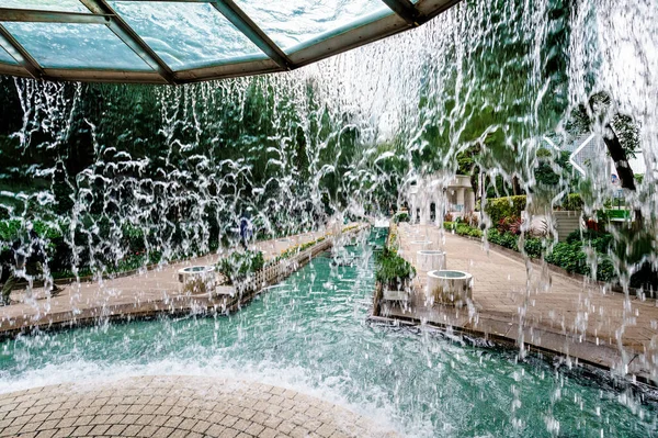 Waterfall fountain on Fountain Plaza in Hong Kong Park.