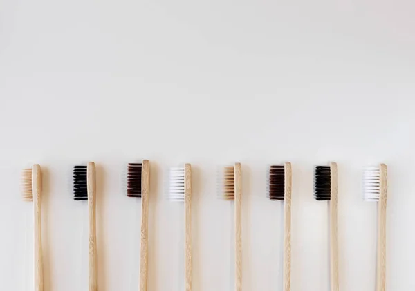 Group Eco Bamboo Toothbrushes White Background Different Color Top View — Stock Photo, Image