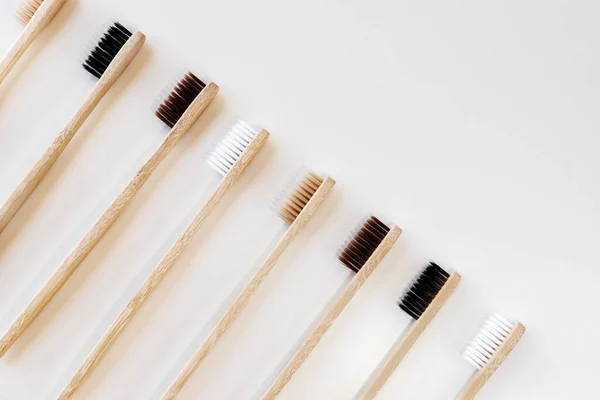 Group Eco Bamboo Toothbrushes White Background Different Color Top View — Stock Photo, Image