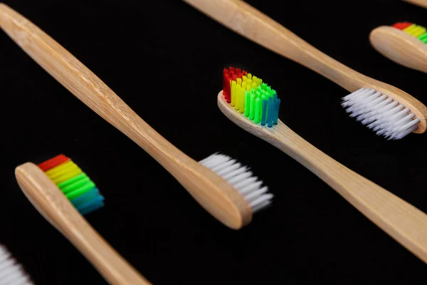 Group White Rainbow Eco Bamboo Toothbrushes Black Background Top View — Stock Photo, Image