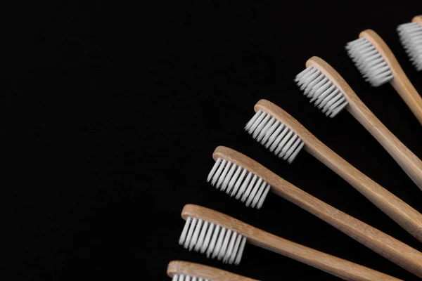 Group White Eco Bamboo Toothbrushes Black Background Top View Copy — Stock Photo, Image