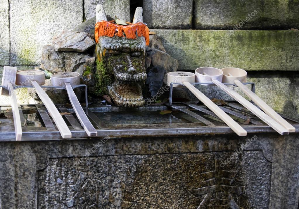 Chozuya purification fountain ladles. Traditional Japanese Shinto wash