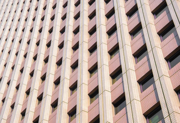 Pink modern building facade.