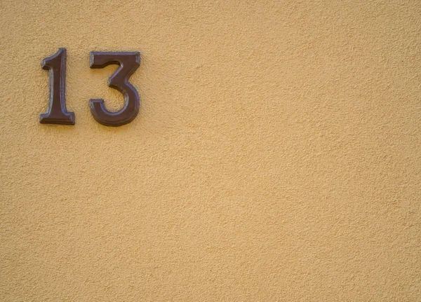 Number of street address with number 13 closeup