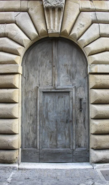 Italian architecture detail. Old medieval style front door