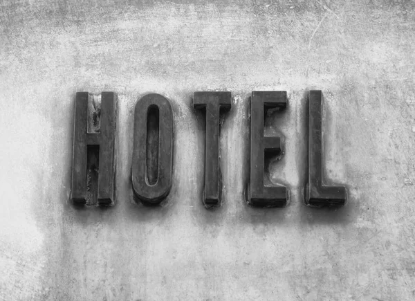 Hotel Sign On Wall Background. — Stock Photo, Image