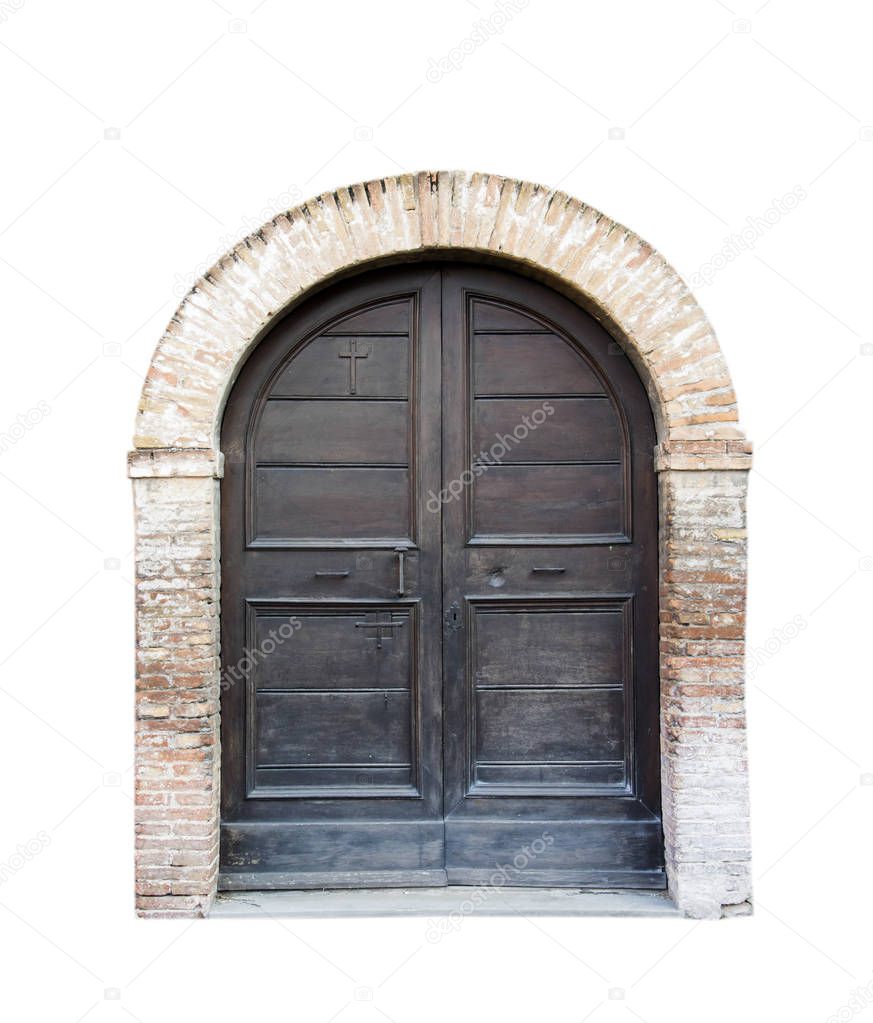 Wooden door in an old Italian house, isolated on white.