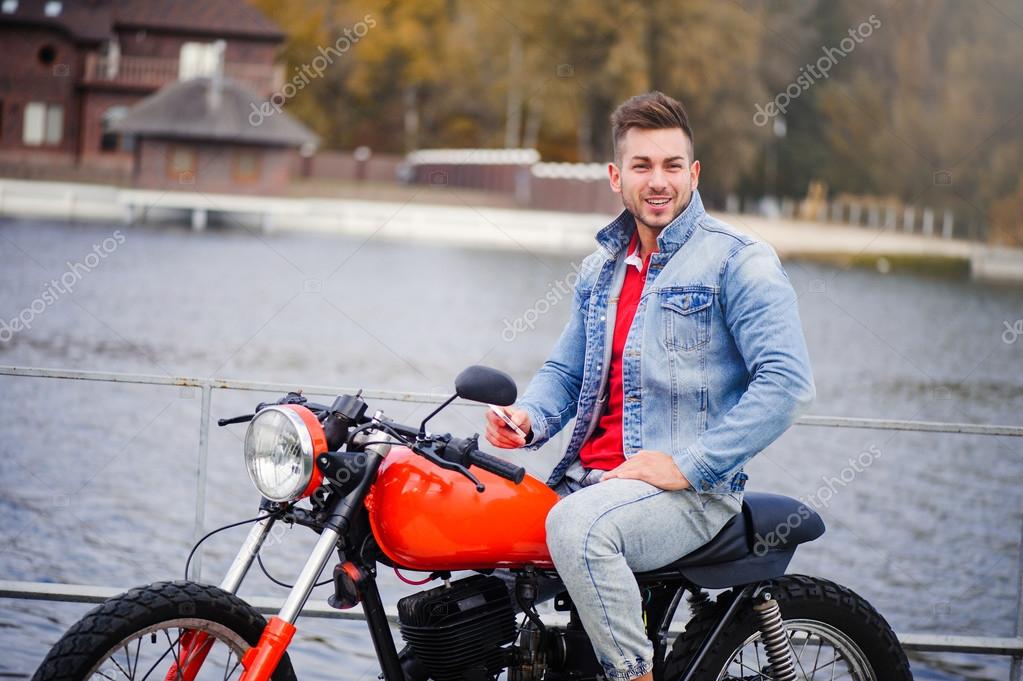 depositphotos 127559710 stock photo trendy guy on a motorcycle
