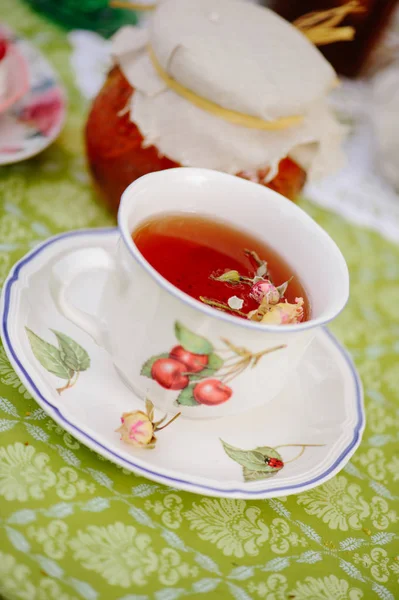 Tea with roses and jam — Stock Photo, Image